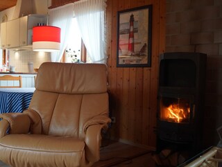 In front of the wood stove