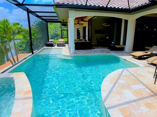 Pool with Sunshelf and Spa