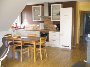 Ferienwohnung Alt Glowe avec terrasse sur le toit
