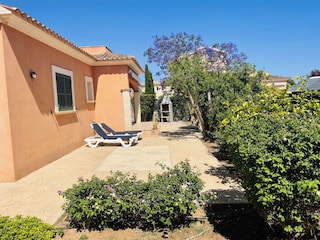 Sun beds in the private garden and also near to the poo