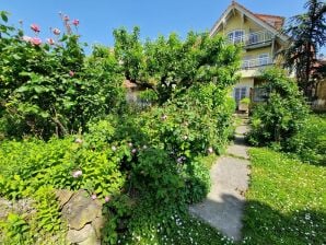 Ferienwohnung "Zum Maulbeerbaum" im Haus Naturgarten (EG)