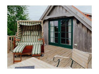 Traveblick- Balkon mit schönem Strandkorb