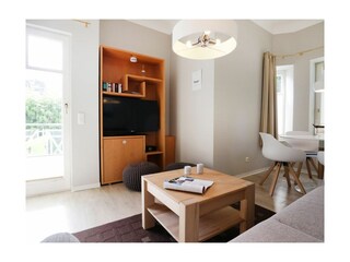 Deutsches Haus Whg. DH3 - Blick auf den TV vom Sofa