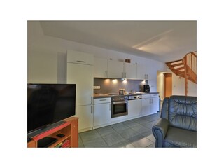 Fischerhaus Whg. Sonnenaufgang - Blick auf den offenen Wohnbereich mit Küche