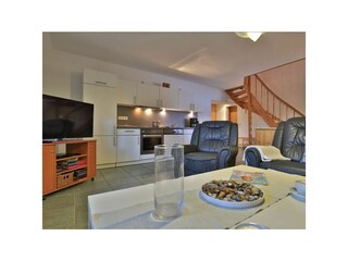 Fischerhaus Whg. Sonnenaufgang - Blick auf den offenen Wohnbereich mit Küche