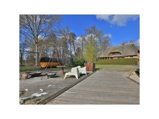 Fischerhaus - Blick auf das Ferienhaus und das Grundstück