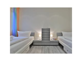 Villa Wagenknecht Whg. 3 - Blick in das Schlafzimmer mit zwei Einzelbetten