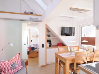 Wohn- / Essbereich mit Fernseher